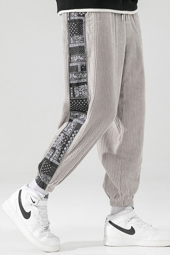 Corduroy-joggerbukser med paisleyprint og sidelommer