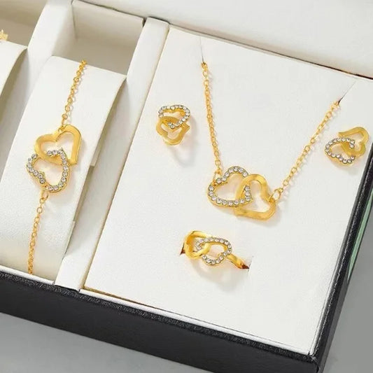 Babette | Elegant guld smykkesæt til kvinder med hjerteformede detaljer og strass – raffineret stil