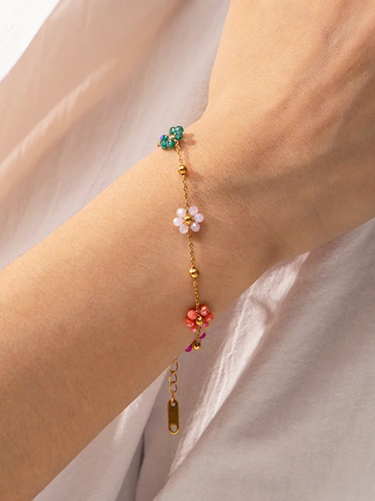 Roseline Farverigt Blomsterarmbånd i Guld