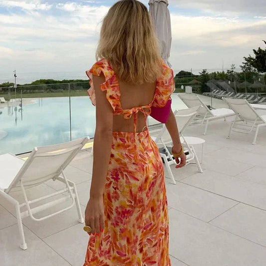 Maxi-kjole med flæser og blomsterprint – elegant sommerstil med et feminint præg