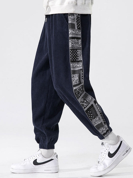 Corduroy-joggerbukser med paisleyprint og sidelommer