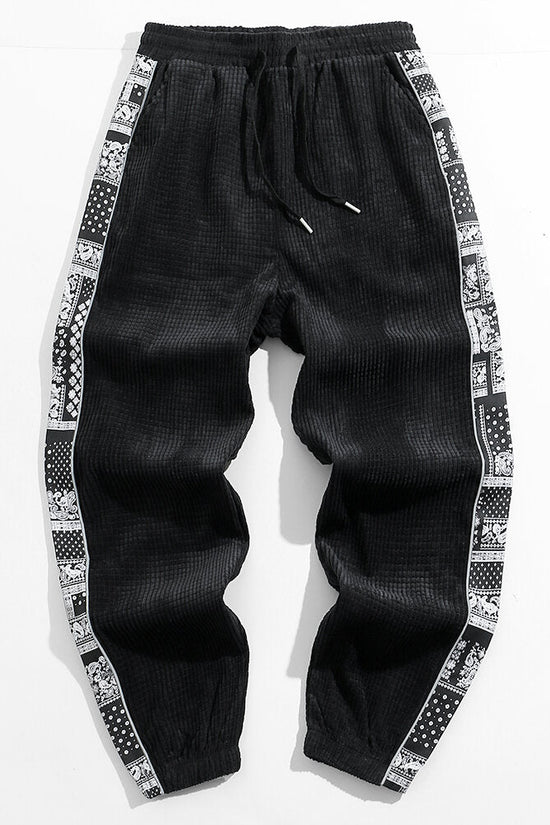 Corduroy-joggerbukser med paisleyprint og sidelommer