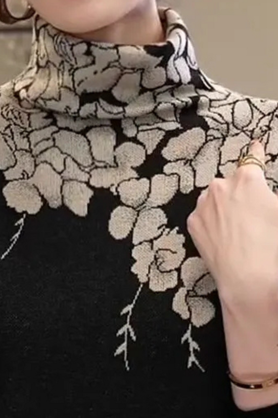 Chic og Elegant Dame Turtleneck med Blødt Blomsterdesign
